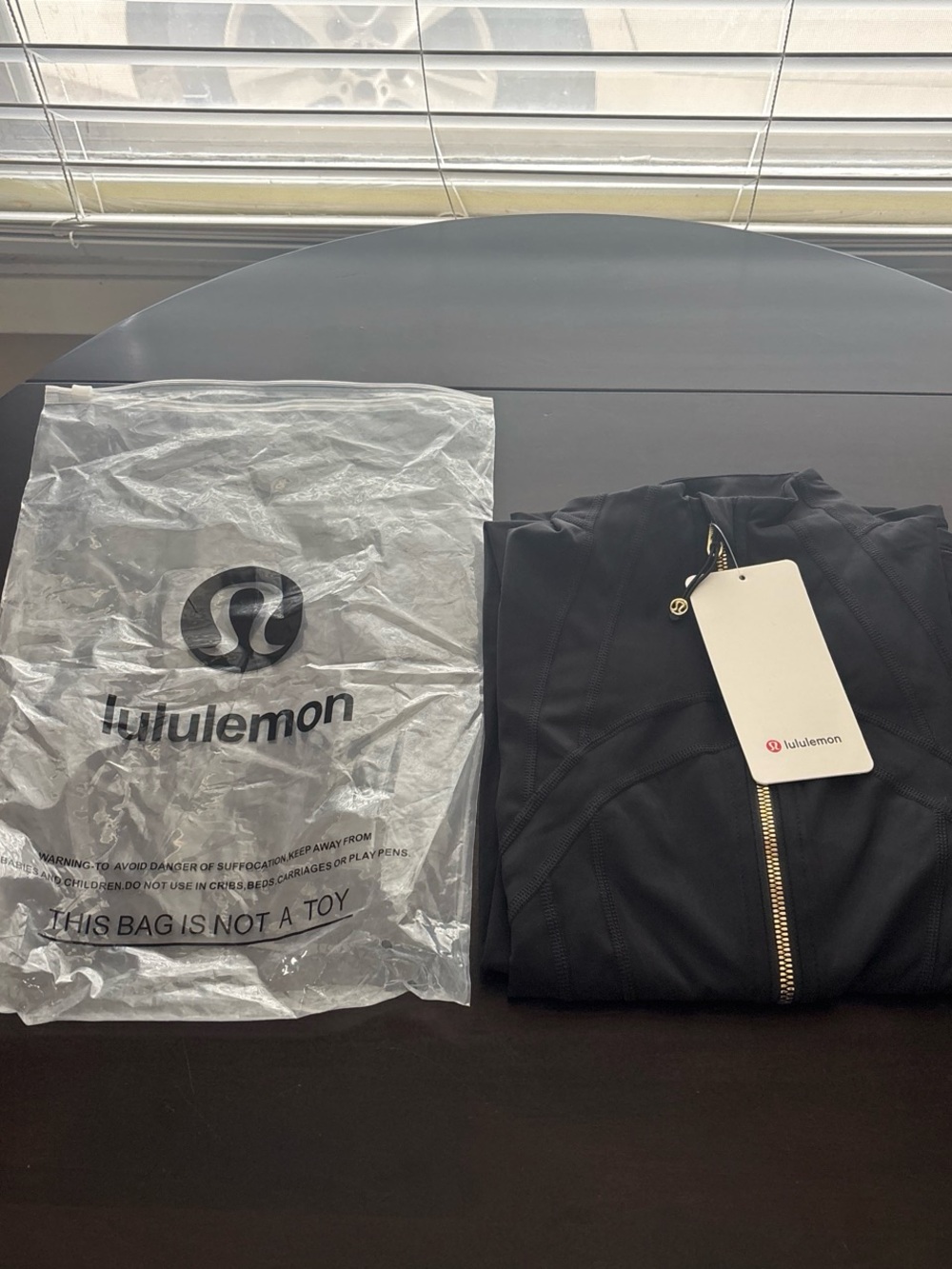 lululemon athletica Men’s Black Performance Zip Jacket with Gold Hardware